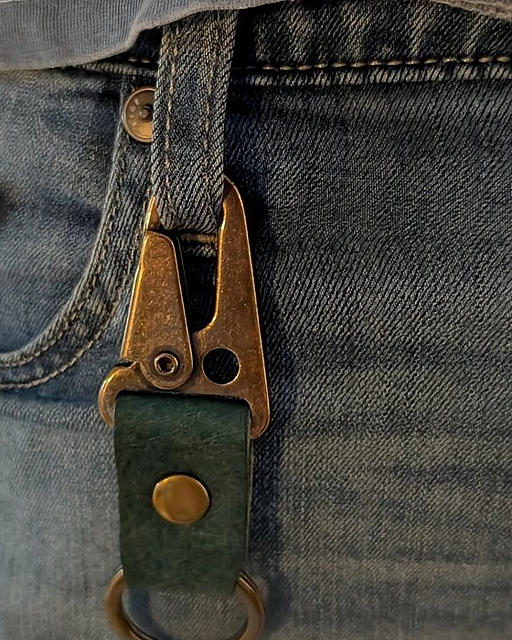 Moonlight Leatherworks leather keychain clipped to jeans